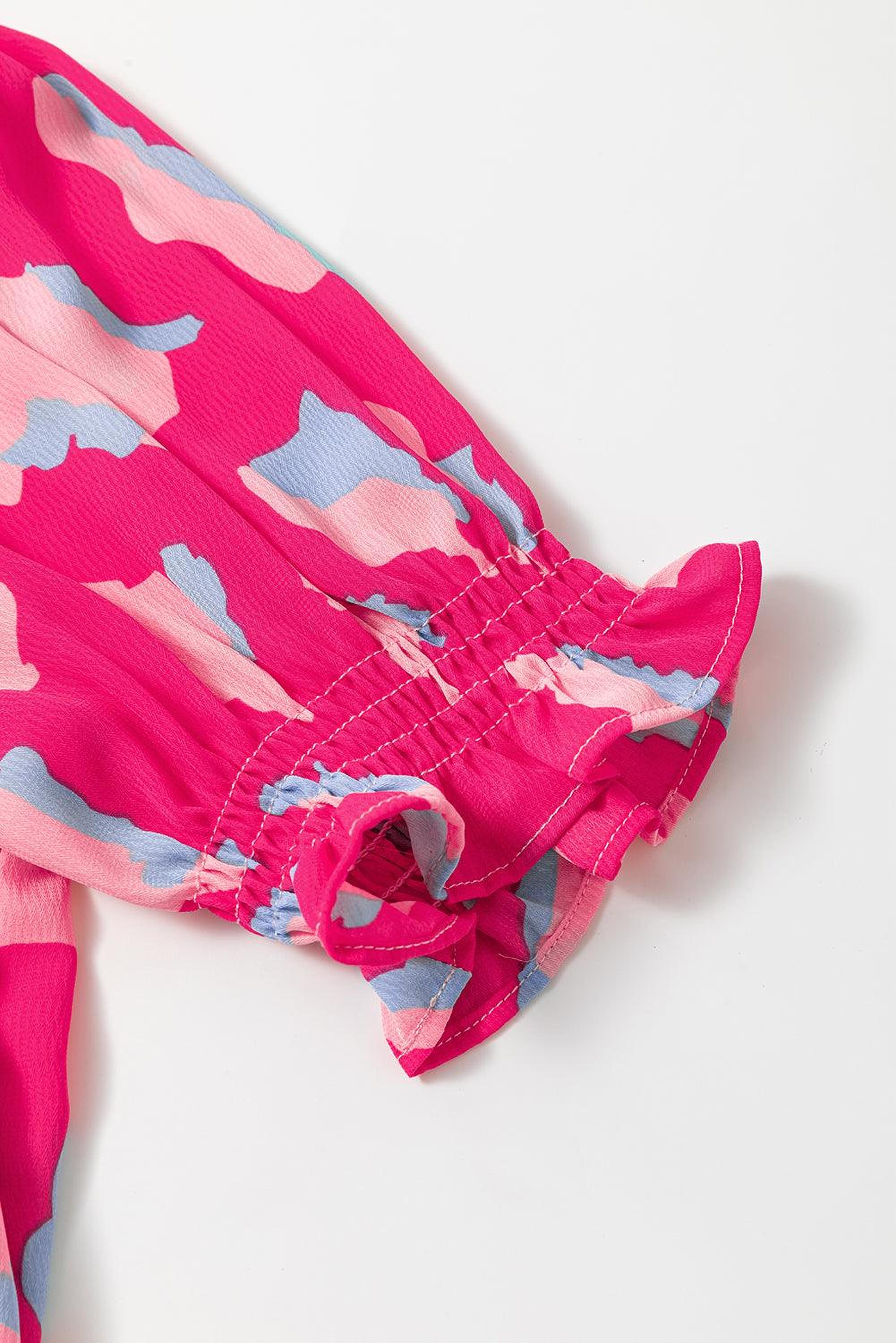 Mini robe avec imprimé abstrait et manches bouffantes
