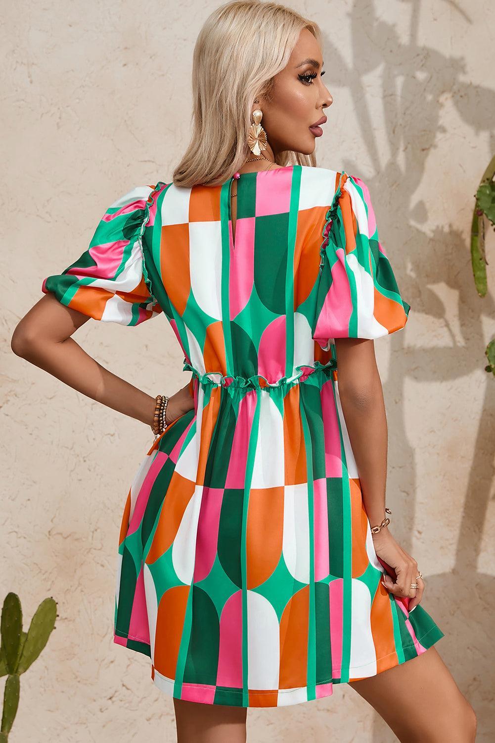 Robe avec imprimé abstrait et manches bouffantes