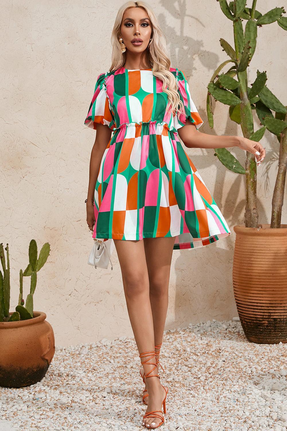 Robe avec imprimé abstrait et manches bouffantes