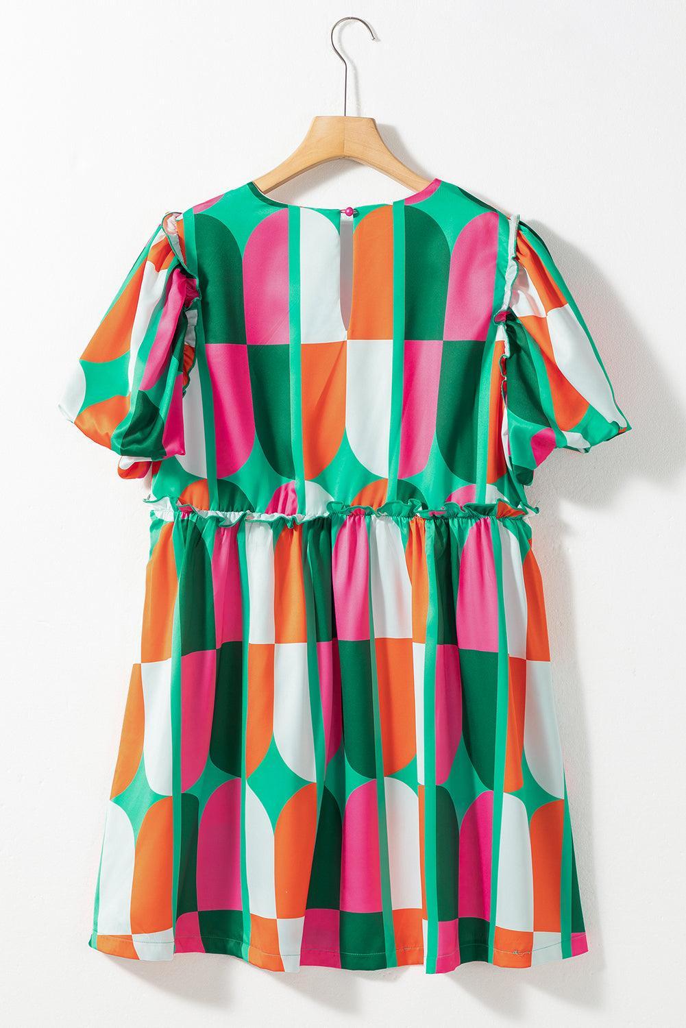 Robe avec imprimé abstrait et manches bouffantes
