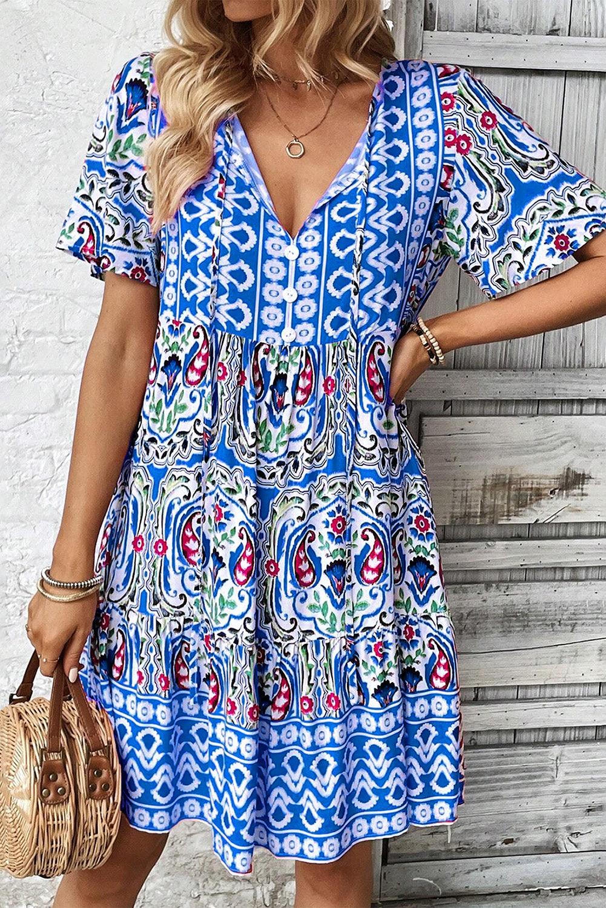Robe bohème élégante avec nœud décoratif et volants