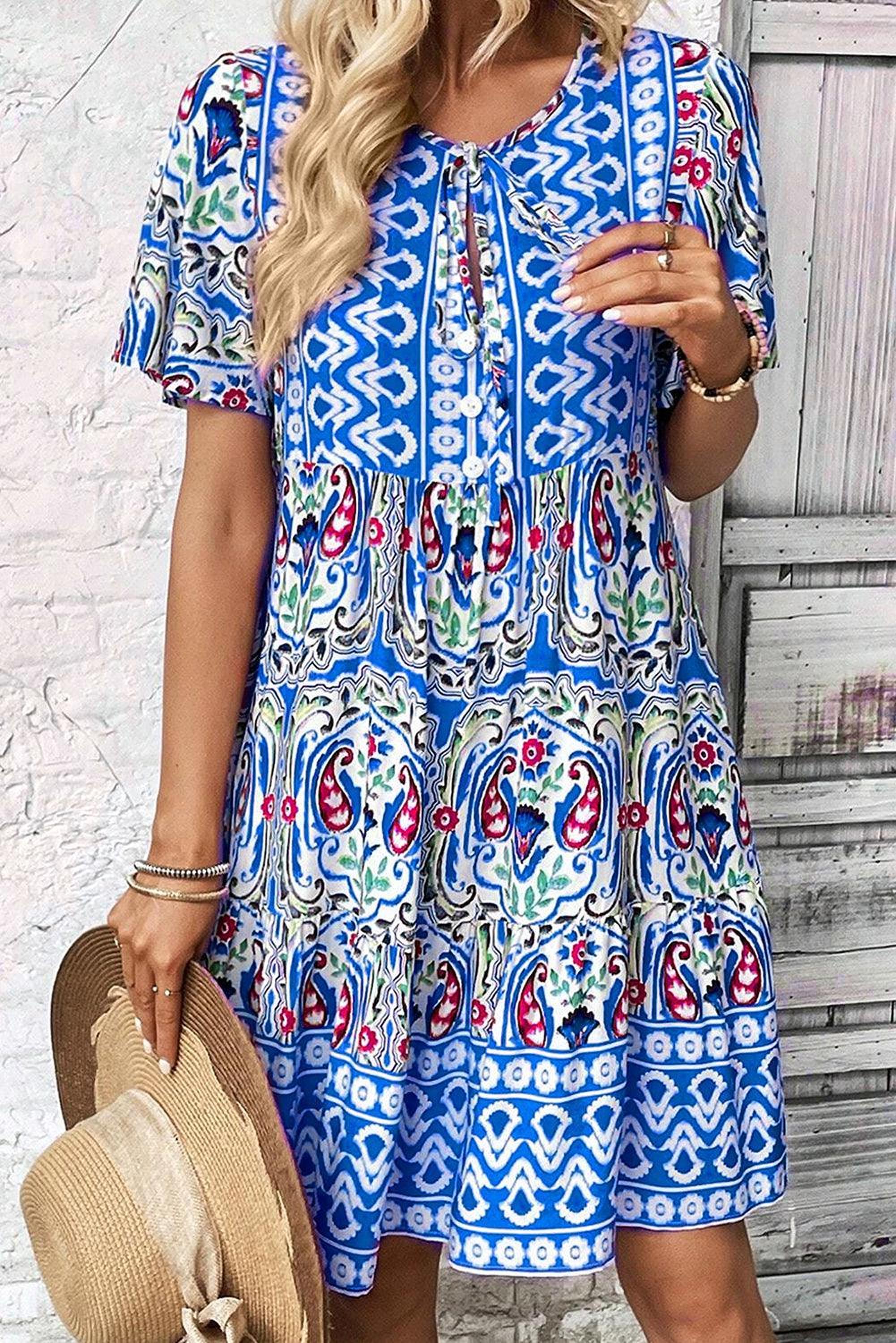 Robe bohème élégante avec nœud décoratif et volants
