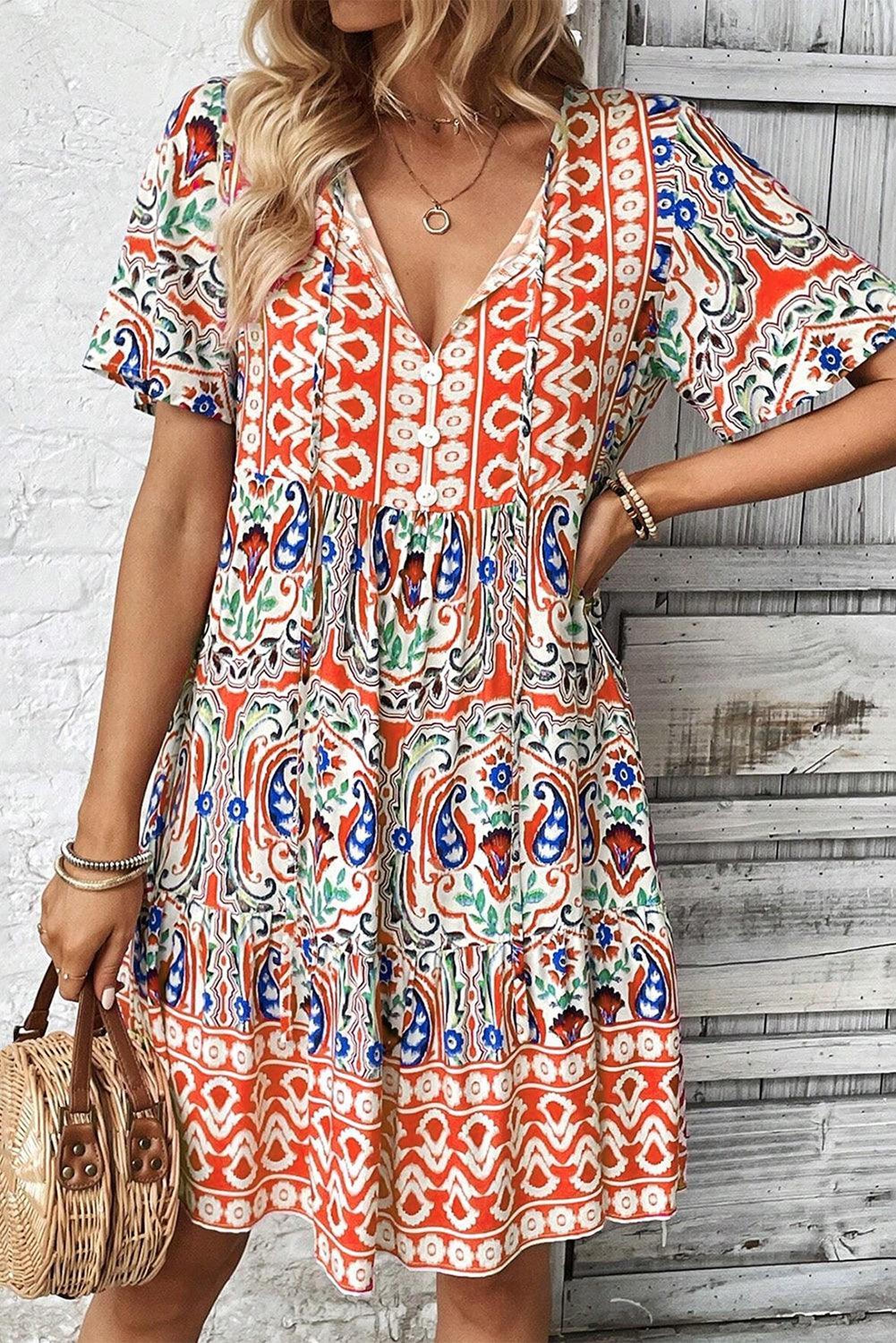 Robe bohème élégante avec nœud décoratif et volants