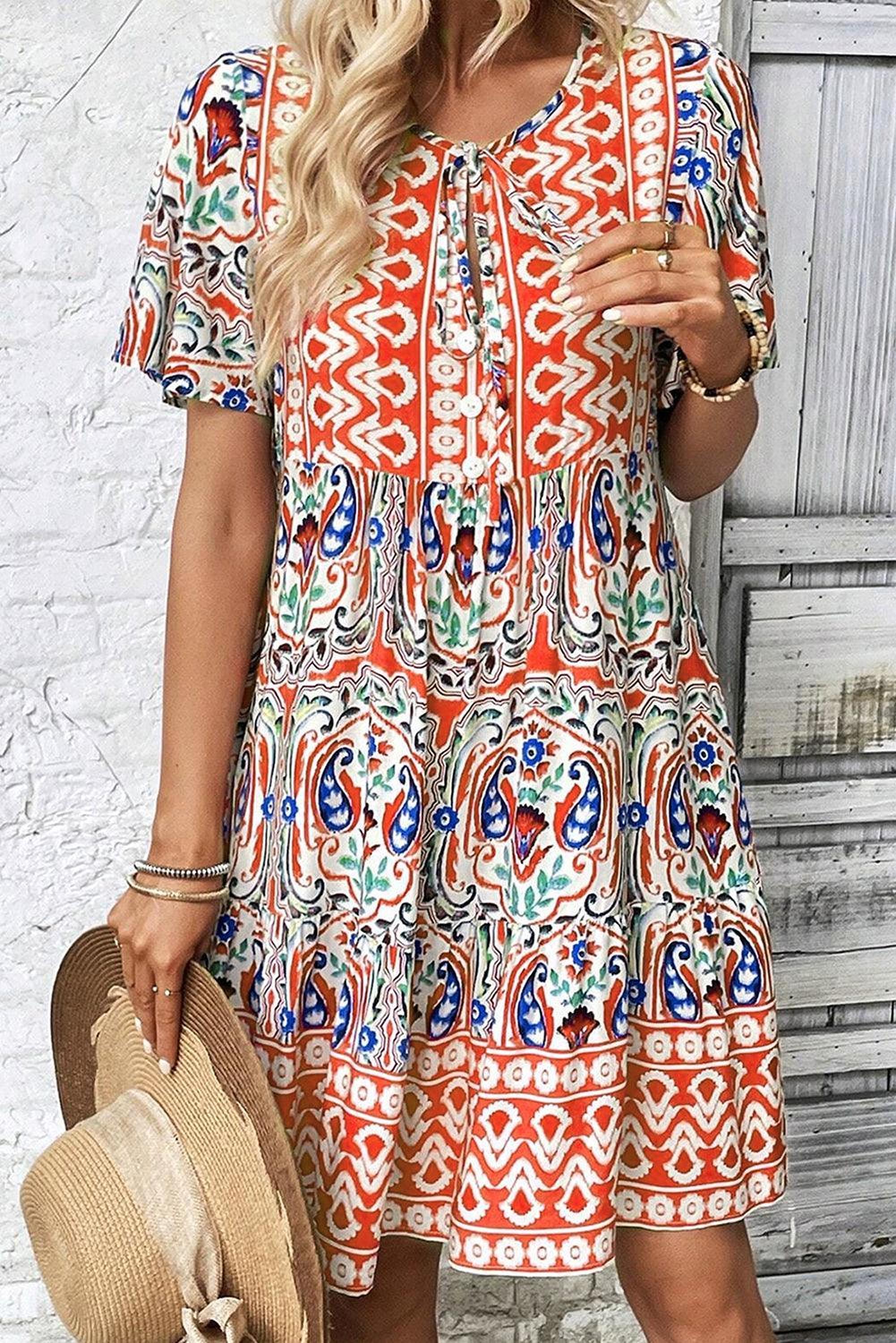 Robe bohème élégante avec nœud décoratif et volants