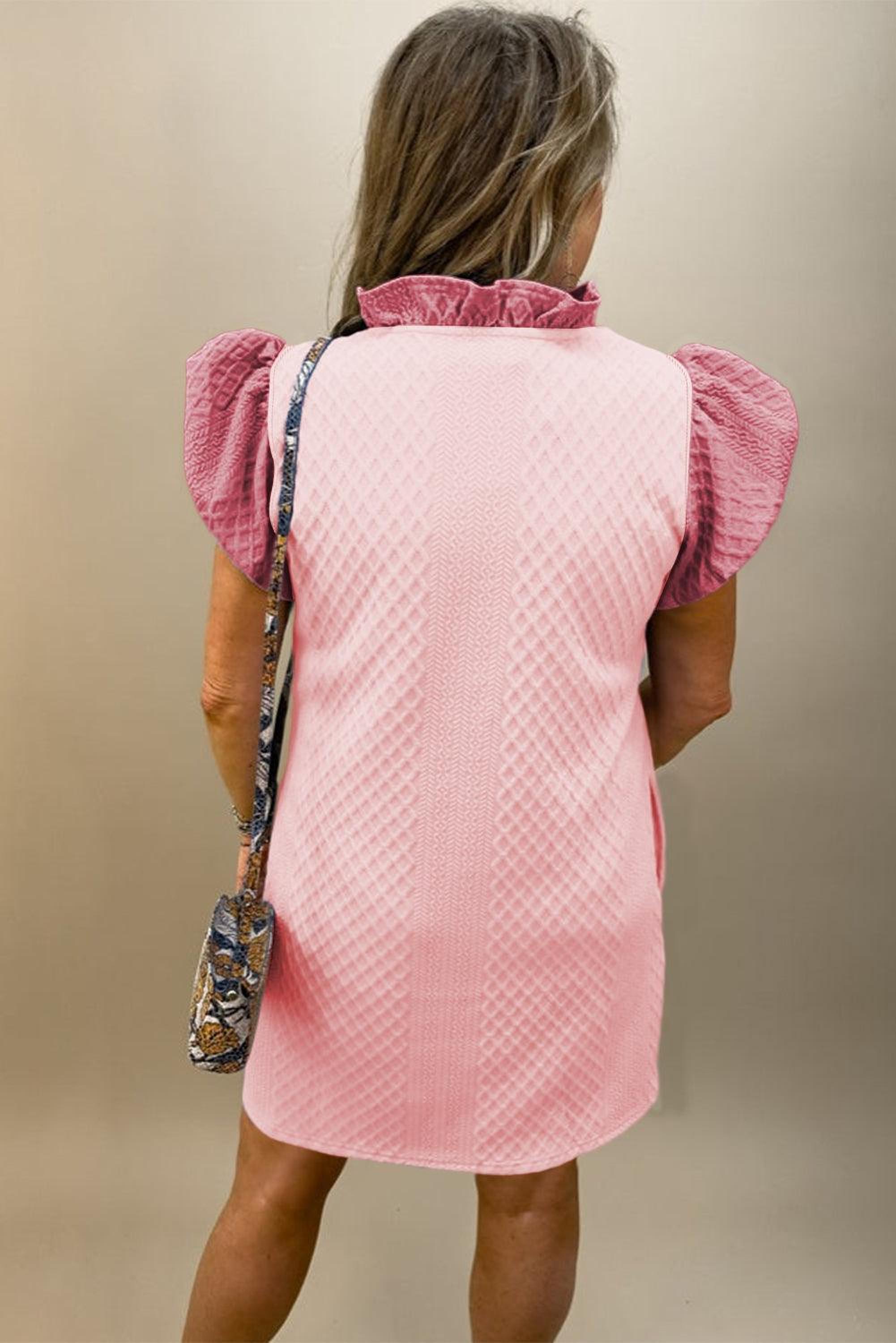 Robe droite structurée avec des manches bouffantes