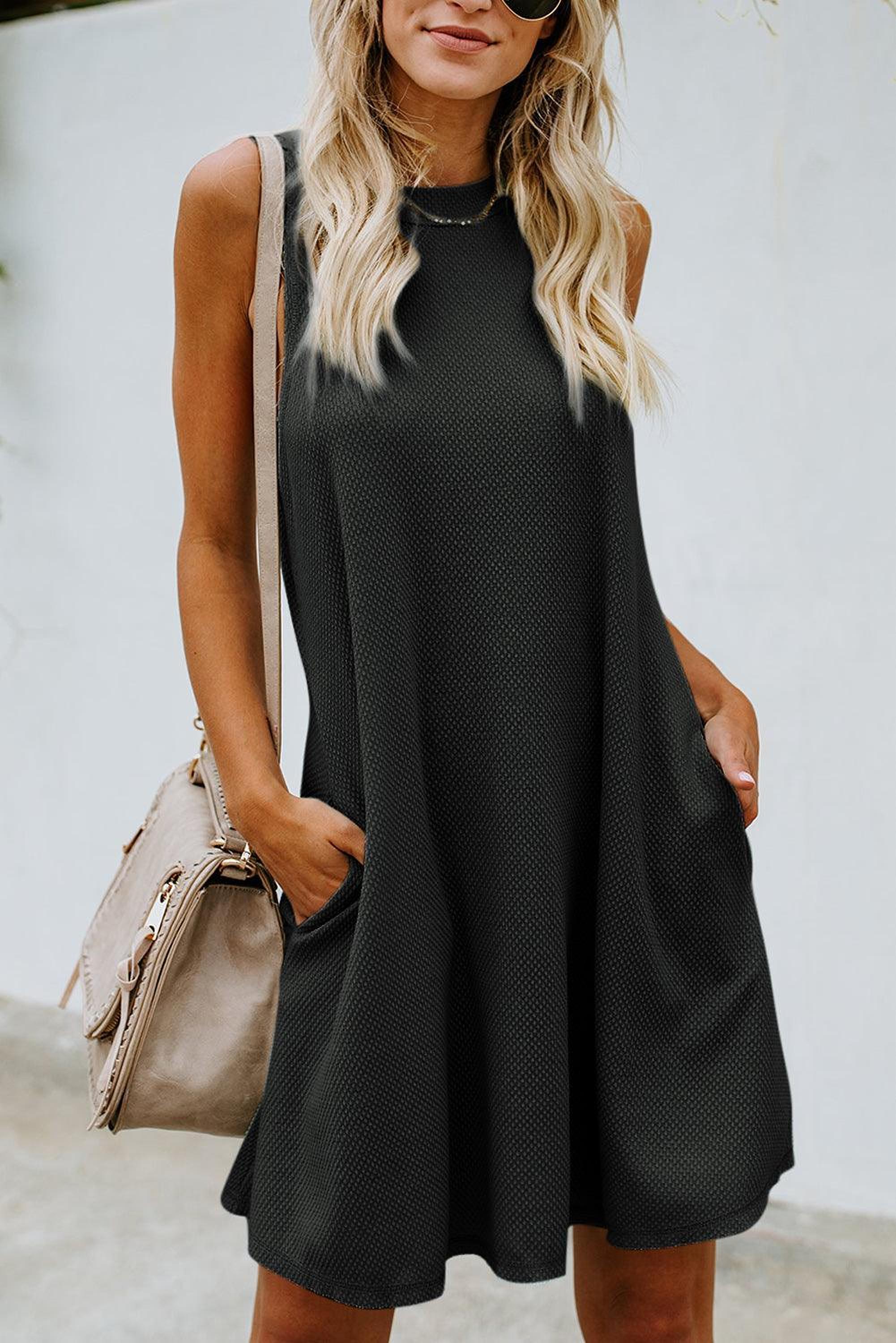 Robe tricotée sans manches avec dos croisé pour un style élégant