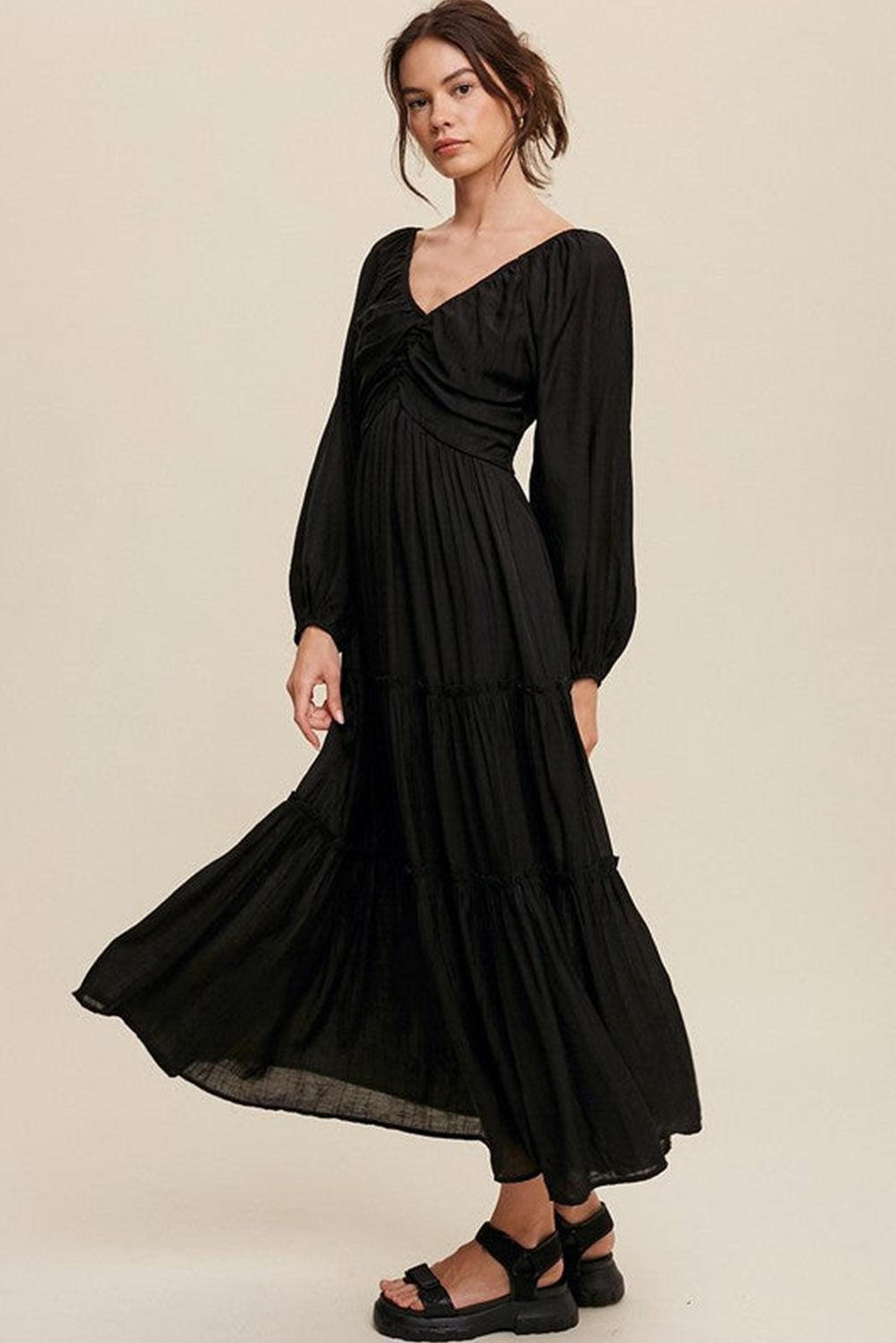 Robe maxi élégante avec décolleté en V et volants