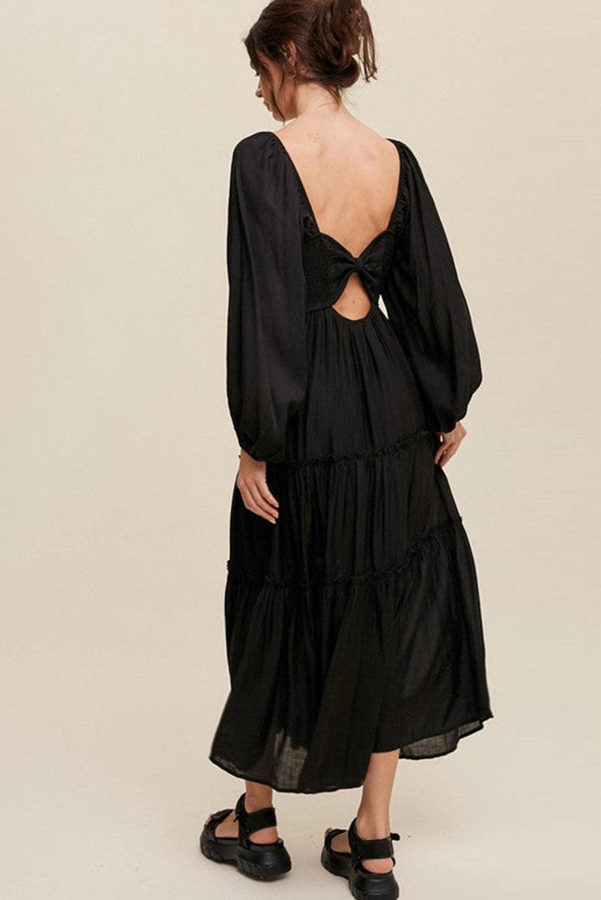 Robe maxi élégante avec décolleté en V et volants