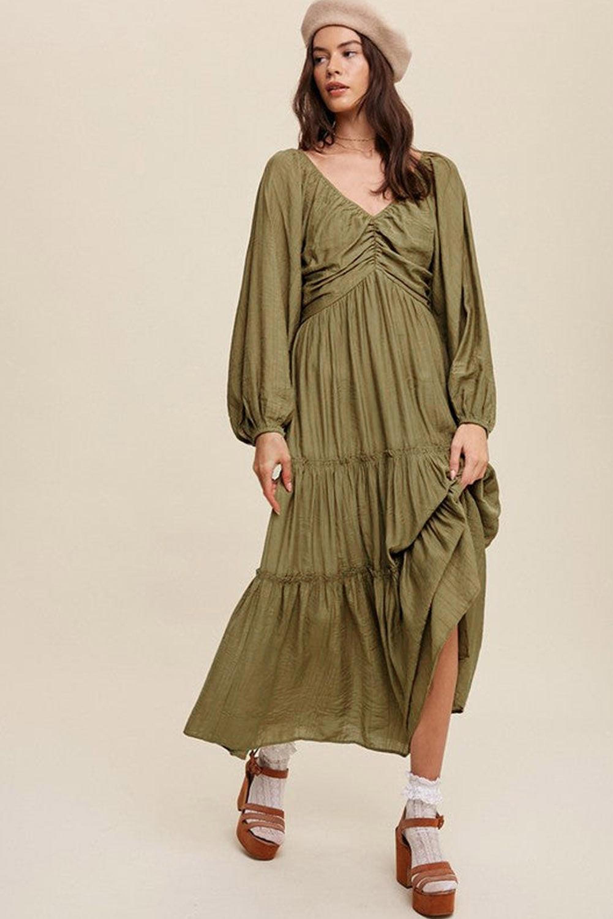 Robe maxi élégante avec décolleté en V et volants