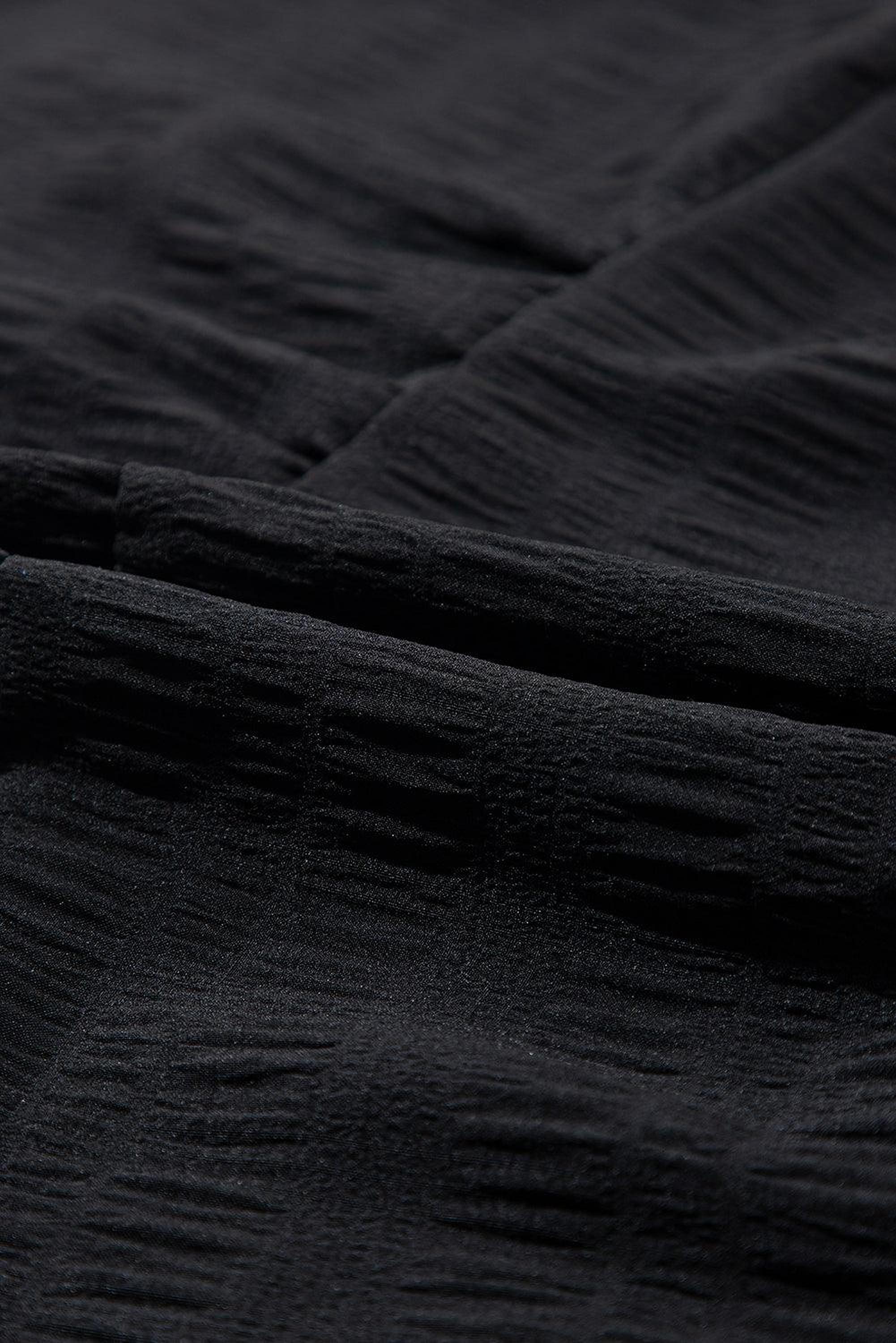 Robe skater à textures smockées avec plusieurs couches