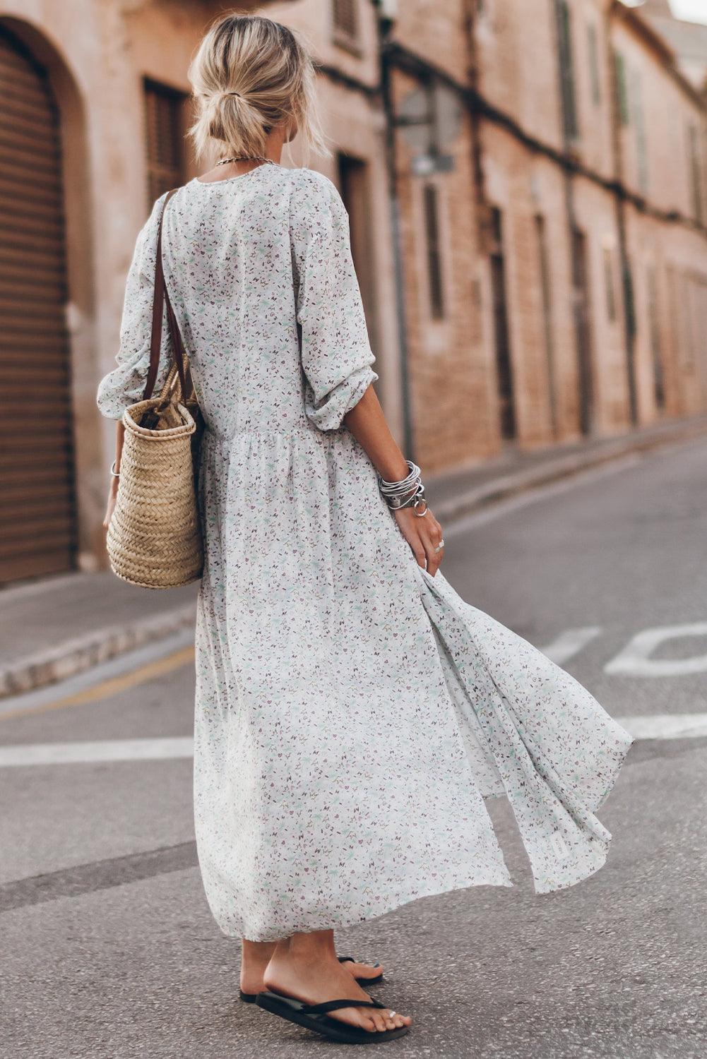 Robe à motifs avec décolleté en V et fente
