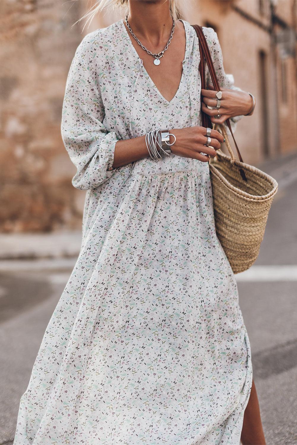 Robe à motifs avec décolleté en V et fente