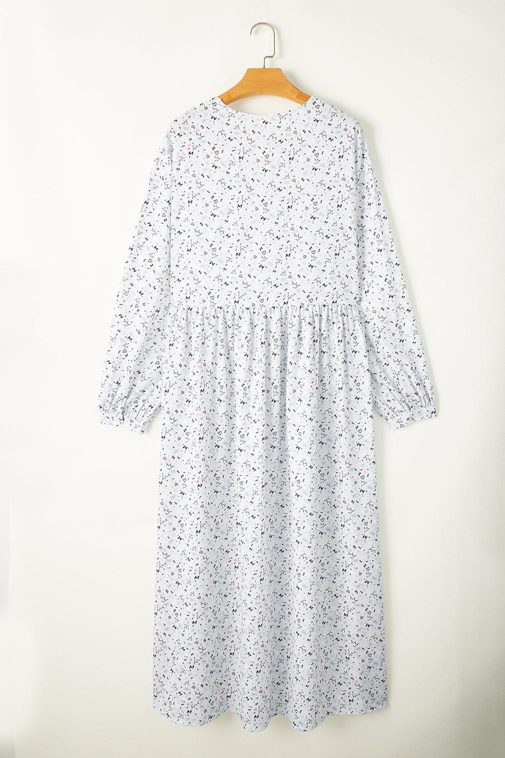 Robe à motifs avec décolleté en V et fente
