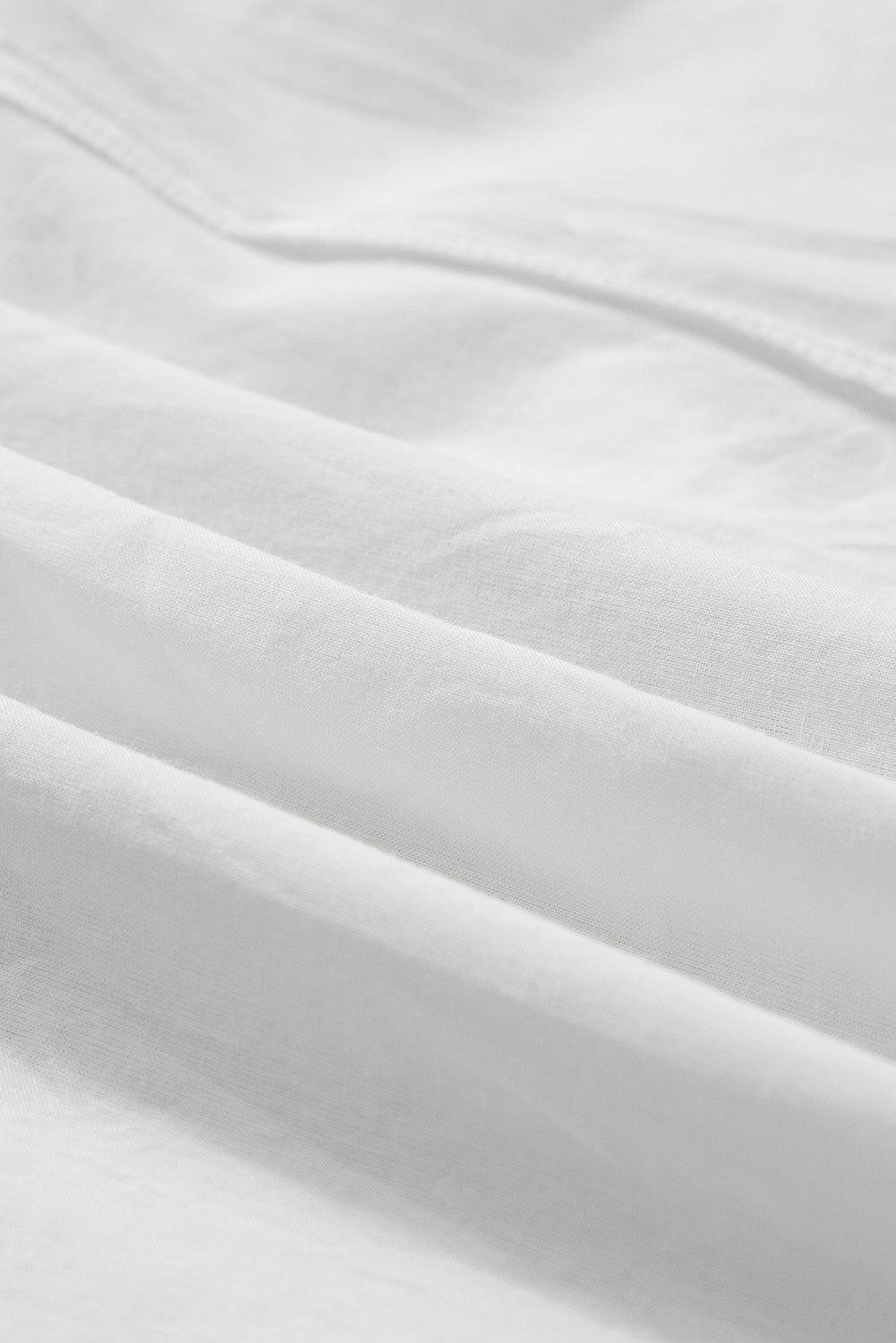 Robe bohème avec un motif d'œillets, style halter sans manches