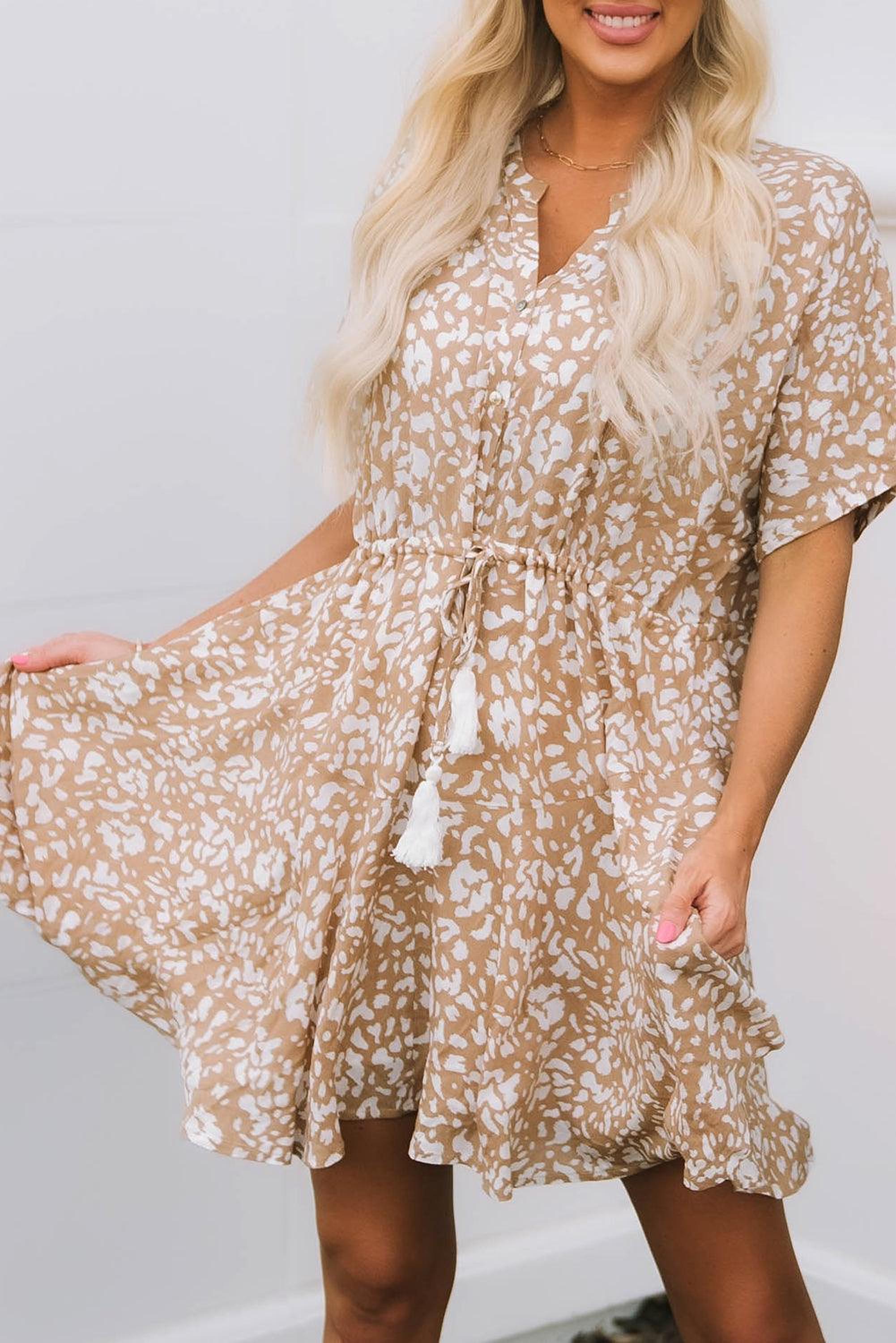 Mini-robe imprimée avec franges et décolleté en V