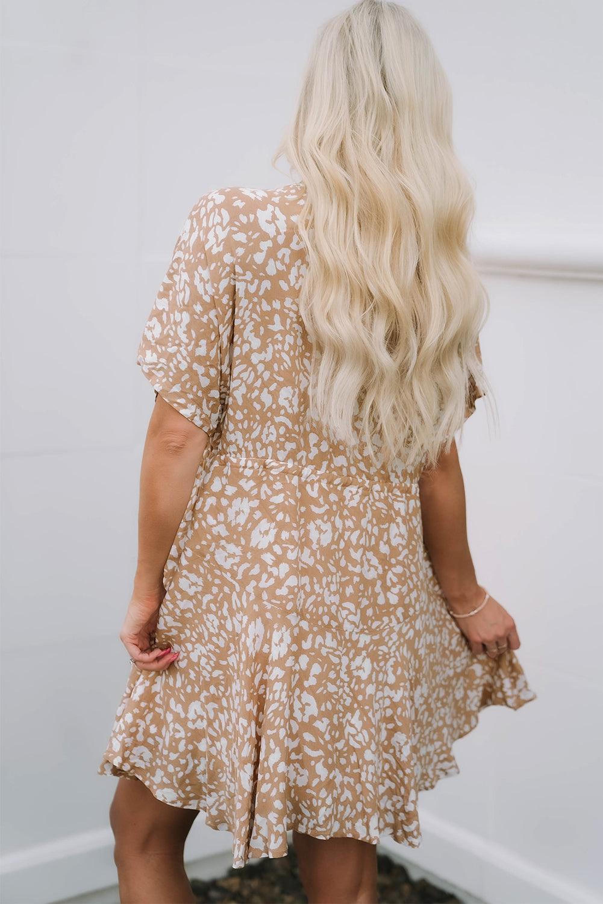 Mini-robe imprimée avec franges et décolleté en V