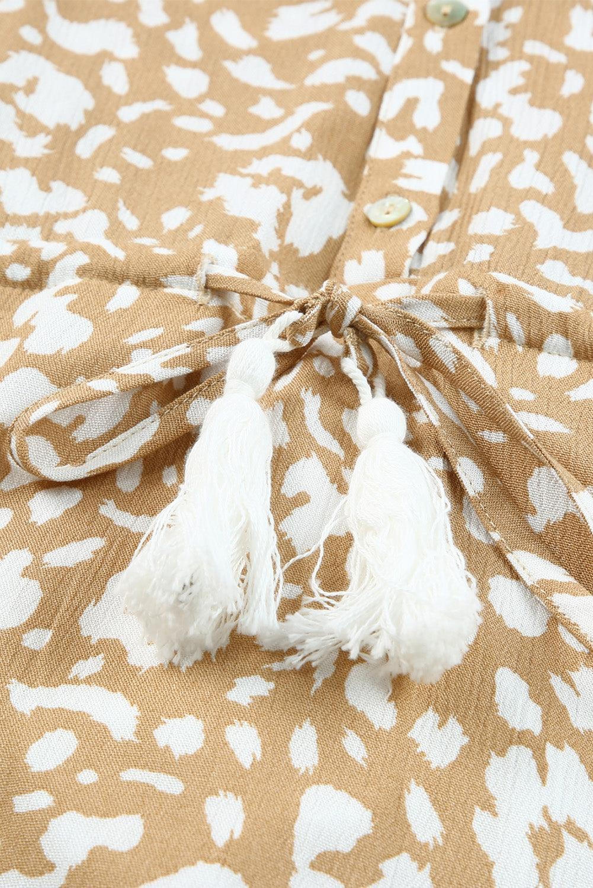 Mini-robe imprimée avec franges et décolleté en V