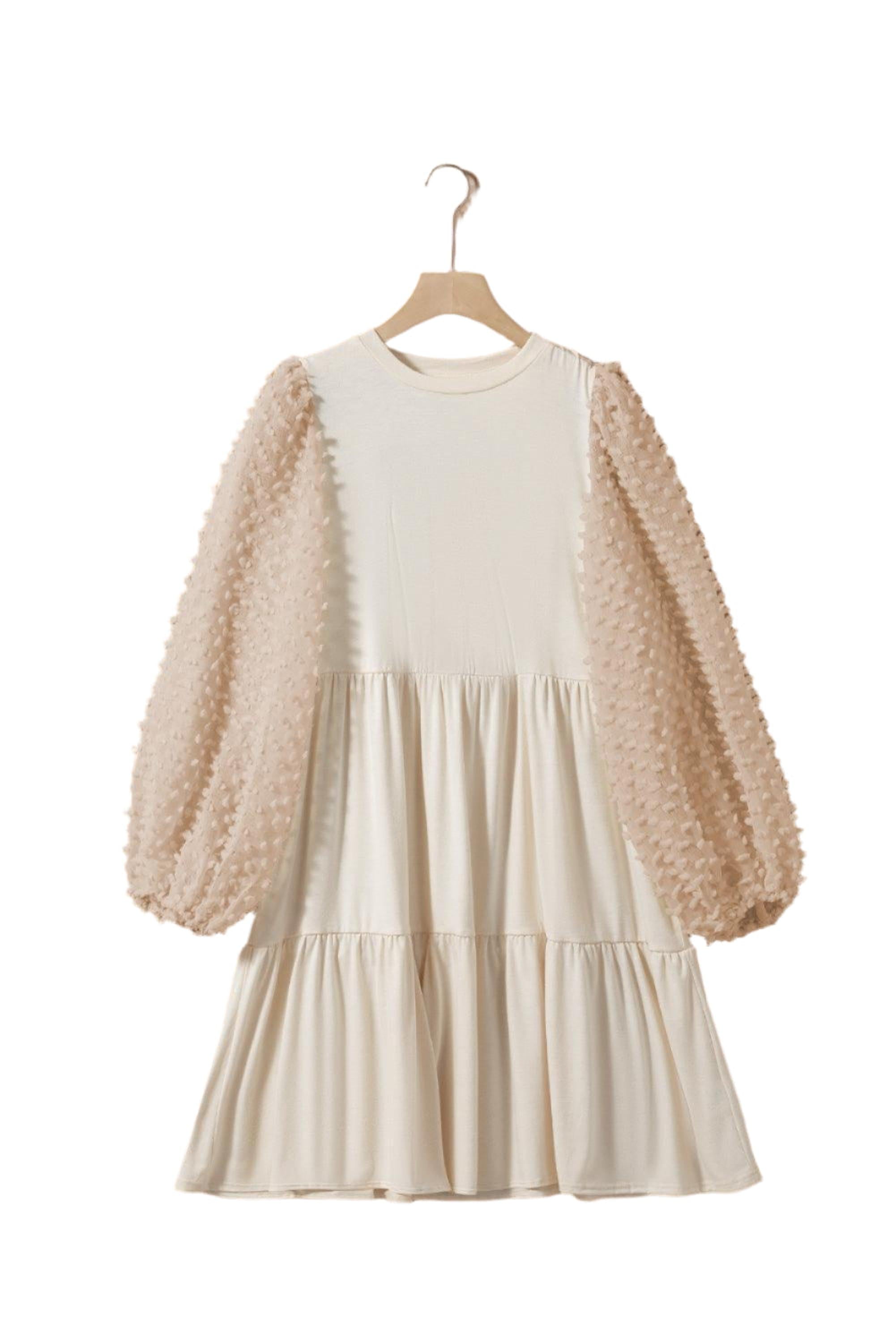 Robe trapèze avec manches bouffantes et détails embellis
