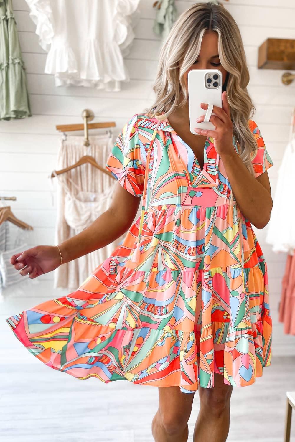 Mini robe colorée avec des détails à franges