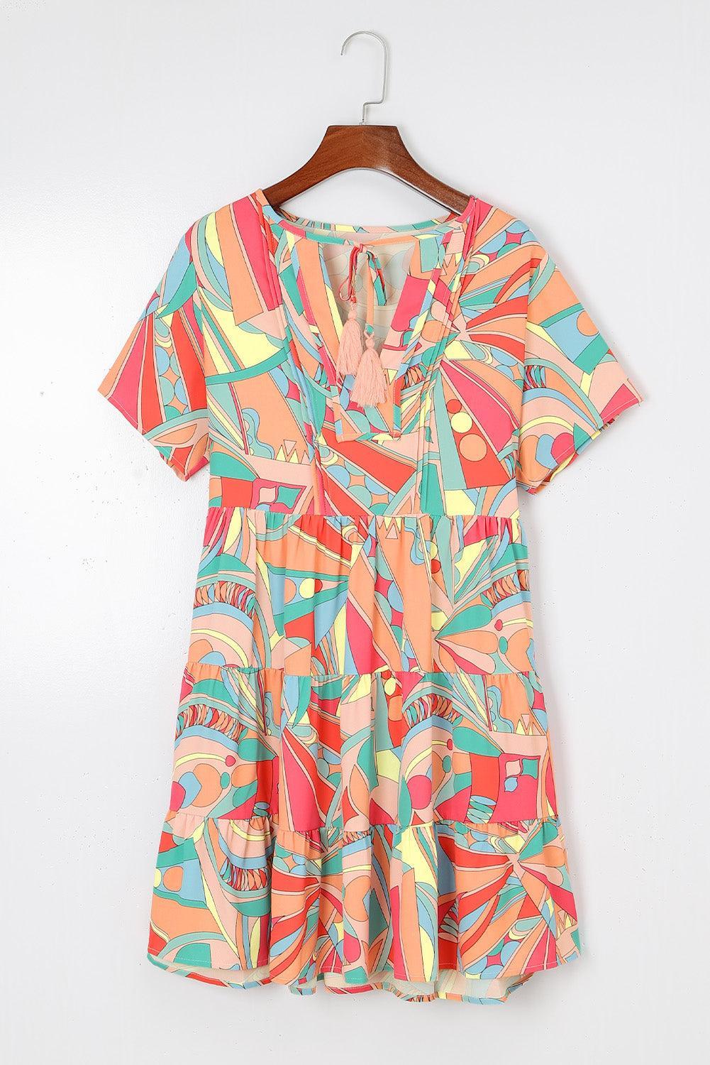Mini robe colorée avec des détails à franges