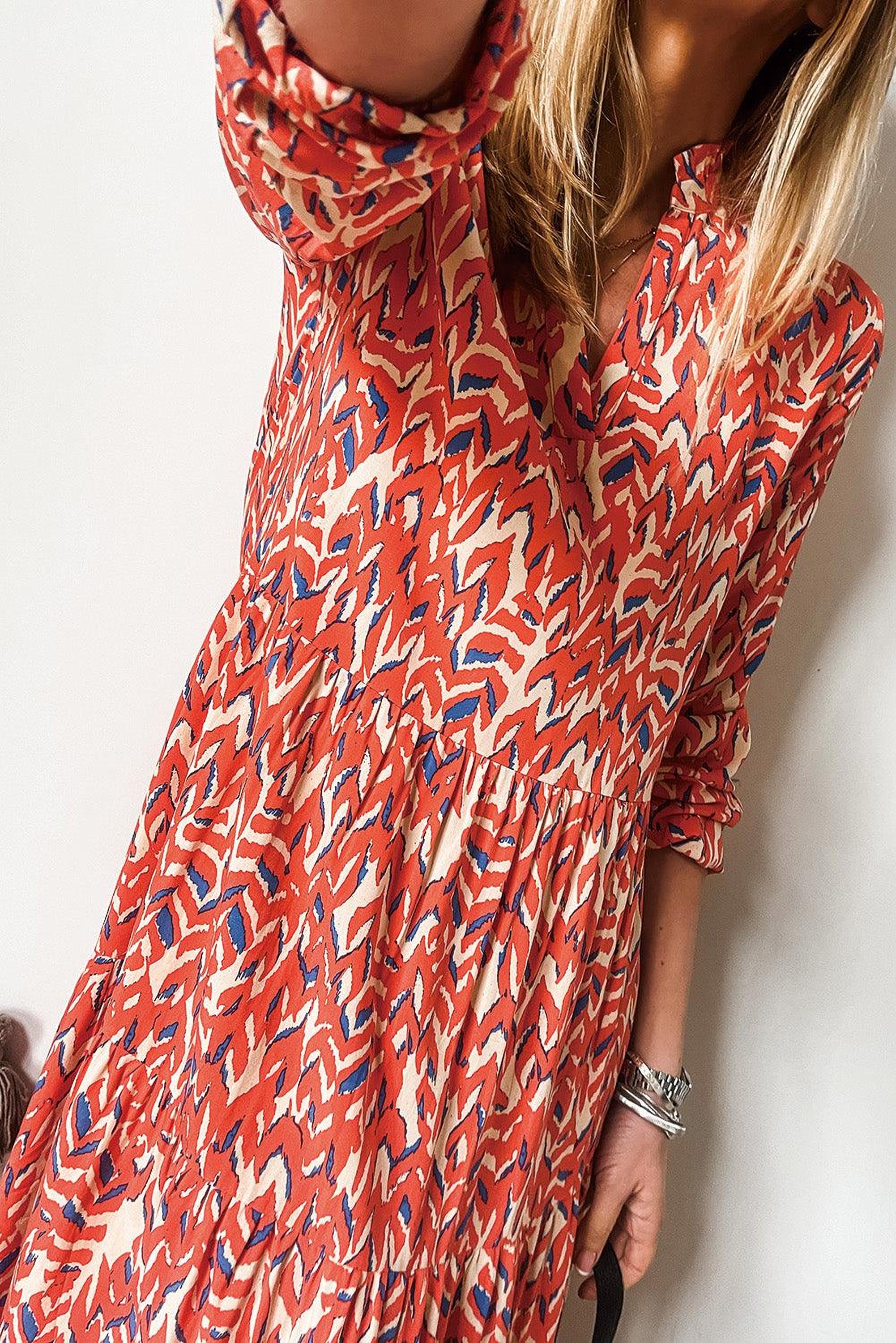 Robe midi plissée avec décolleté en V et imprimé abstrait