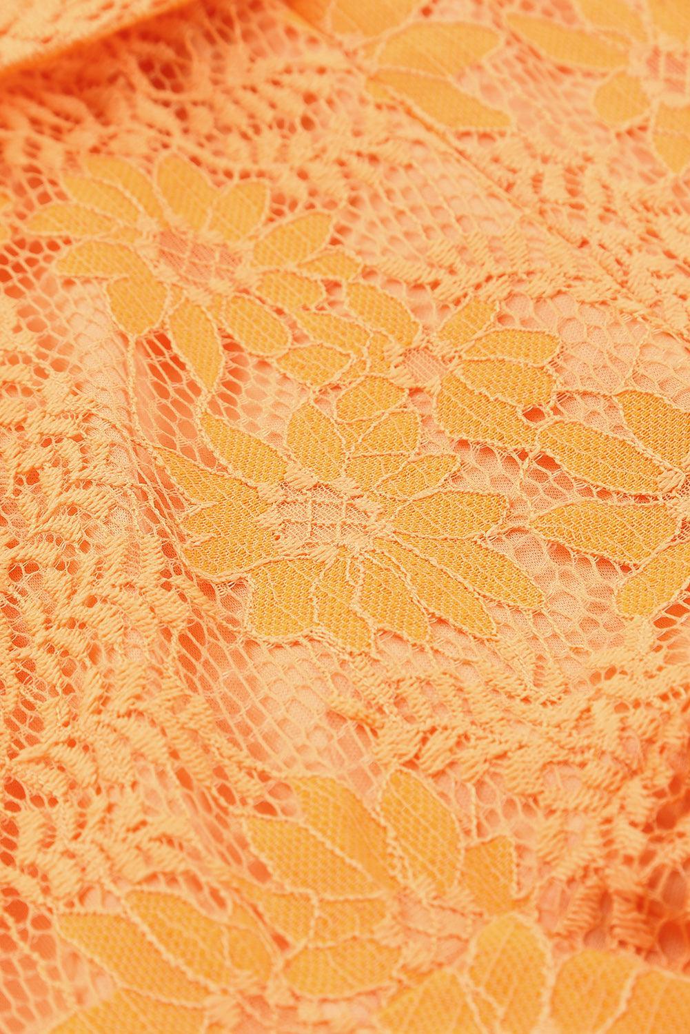 Robe portefeuille en dentelle avec manches et décolleté en V