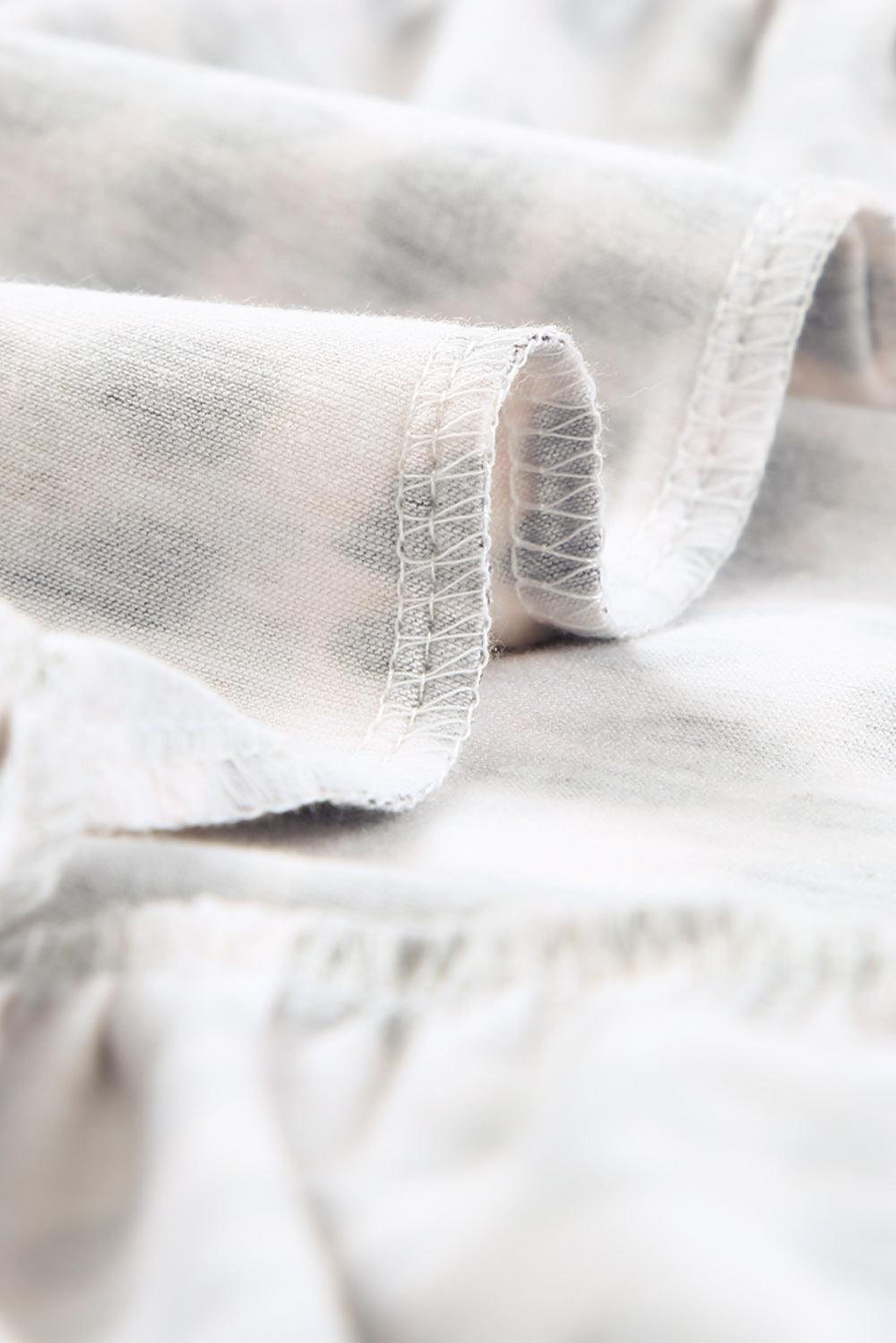 Mini robe sans manches avec imprimé léopard et coupe en couches