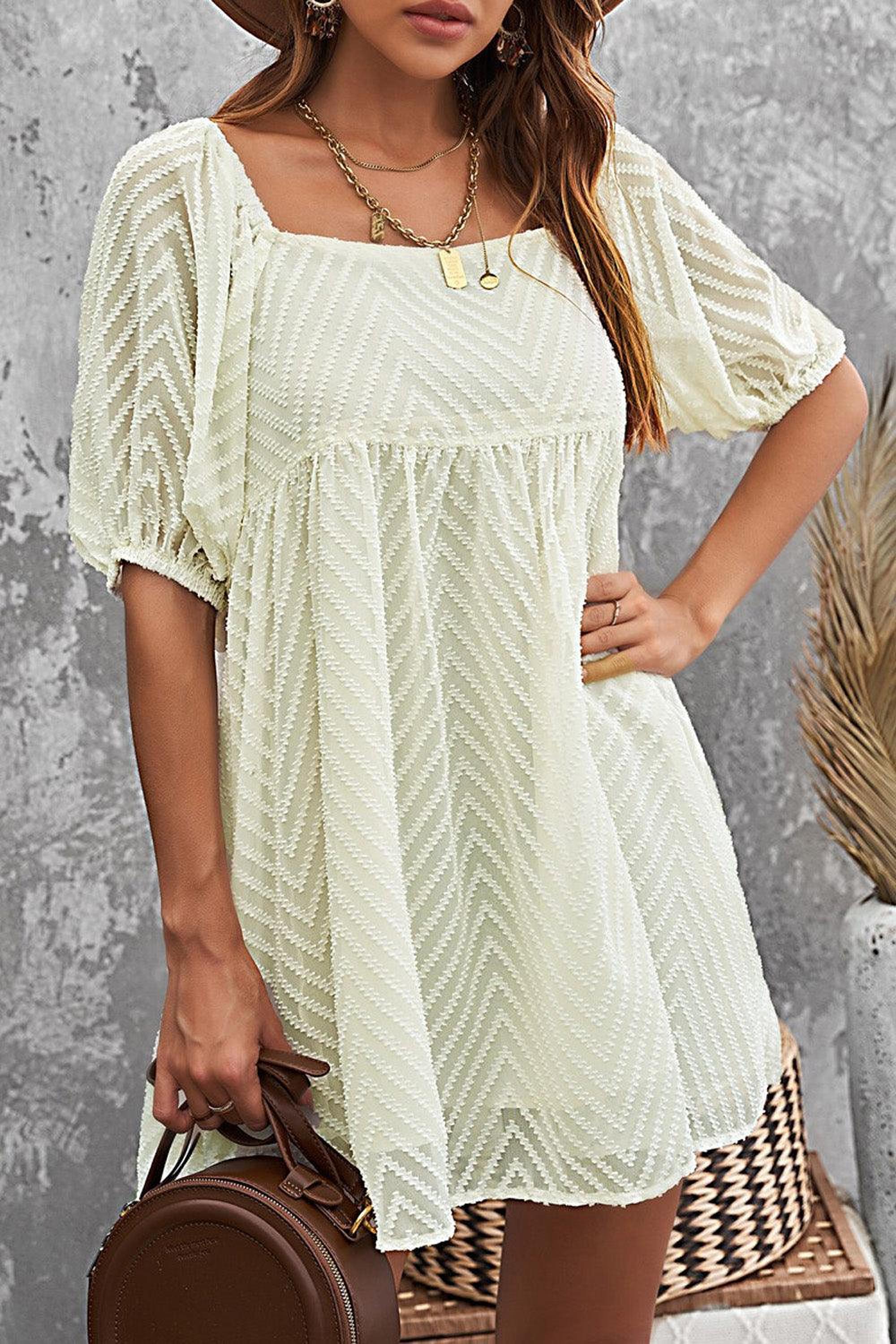 Mini robe style babydoll avec manches bouffantes
