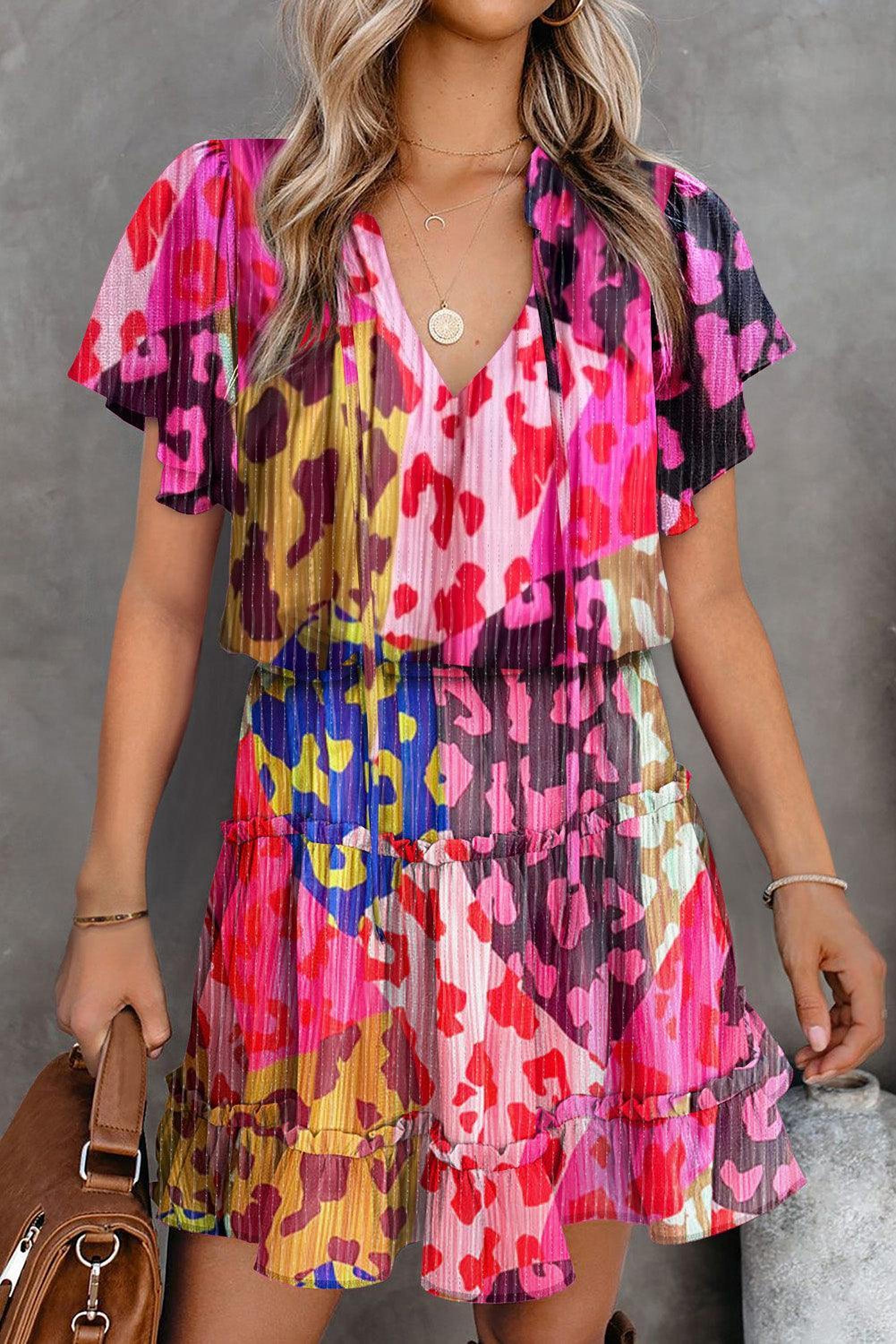 Mini-robe élégante avec imprimé panthère et ruches pour un style félin