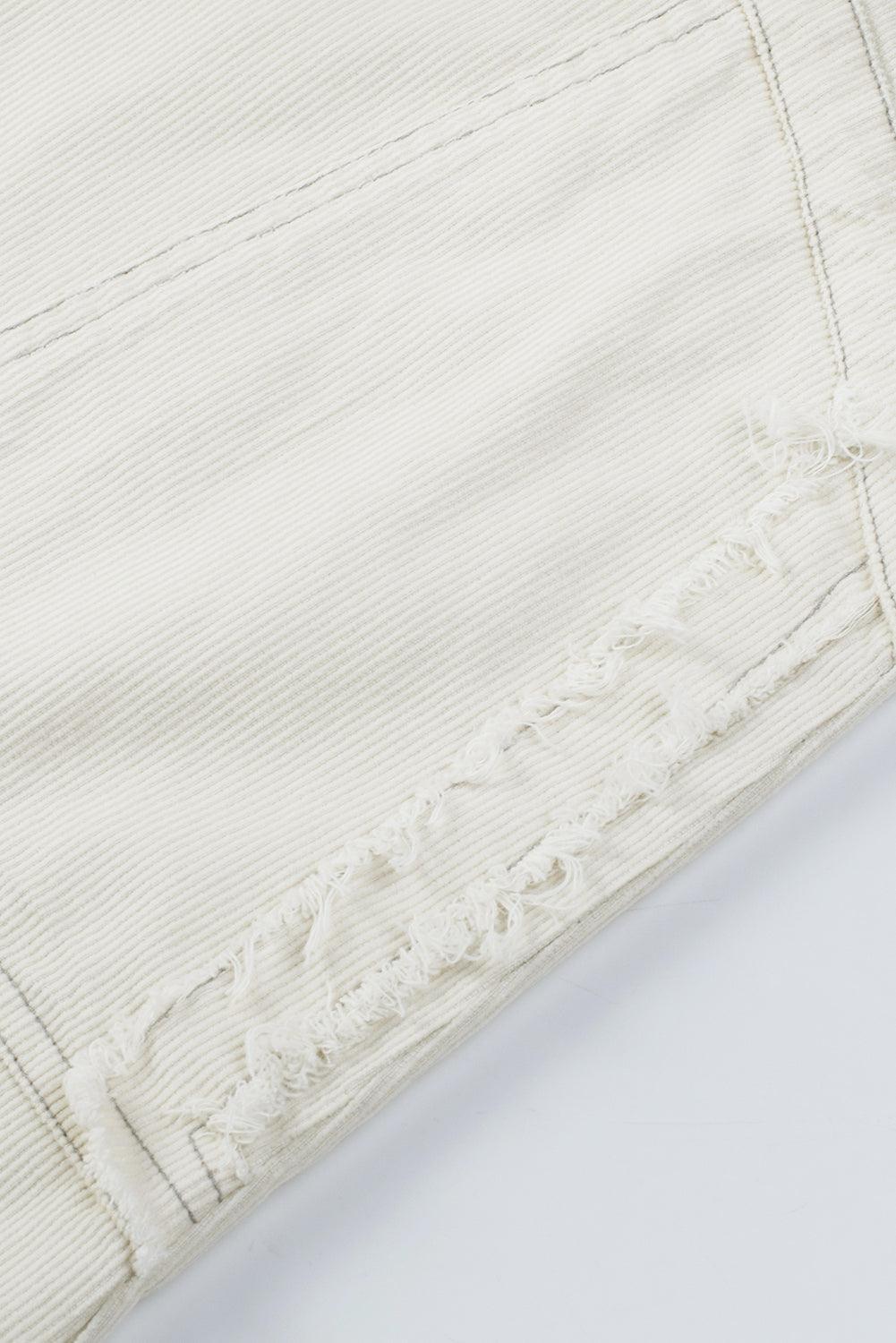 Robe en denim à manches longues avec un ourlet effiloché