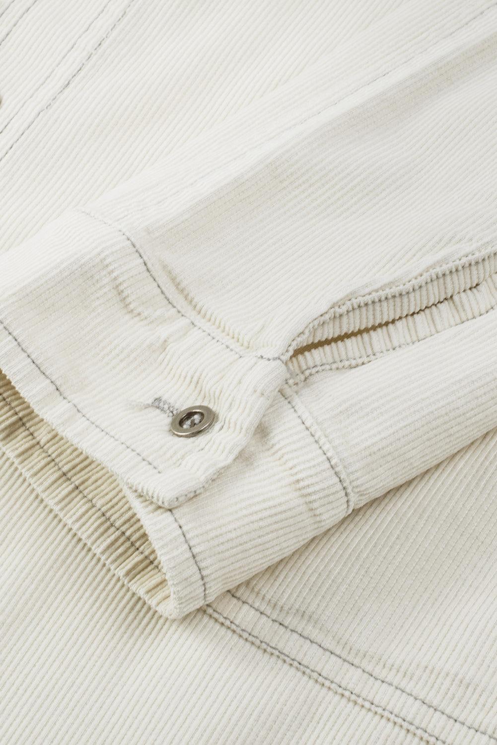 Robe en denim à manches longues avec un ourlet effiloché