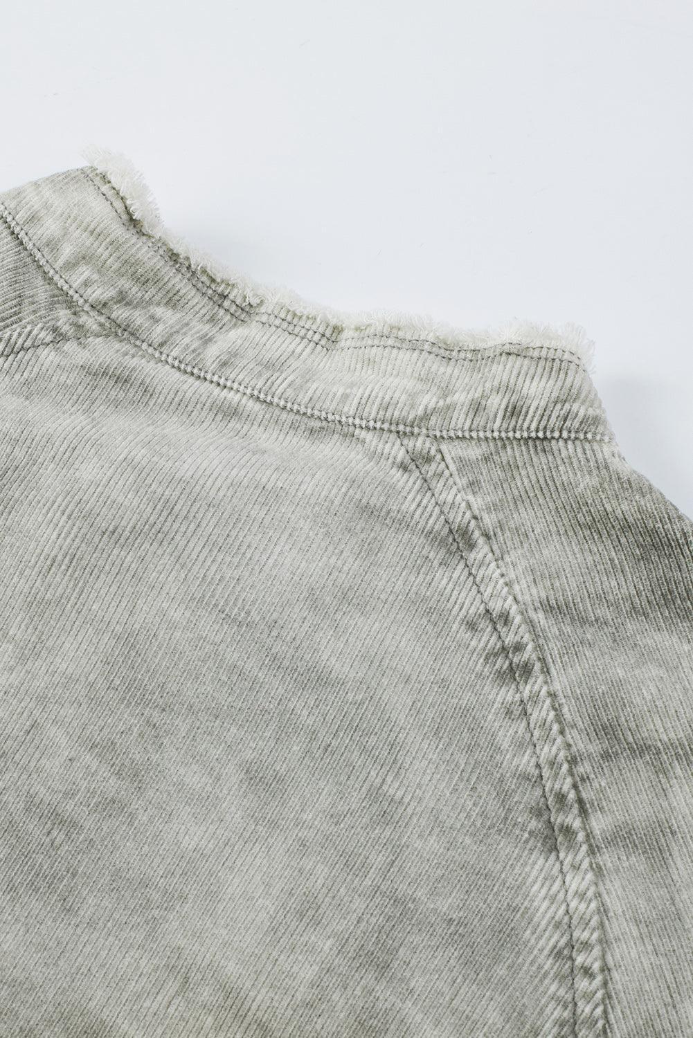 Robe en denim à manches longues avec un ourlet effiloché