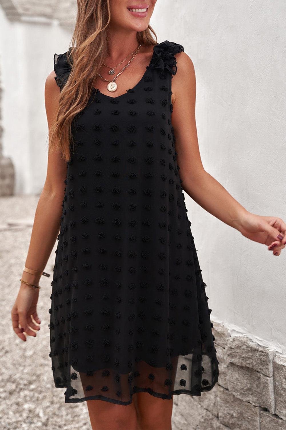 Robe à pois élégante avec col en V et volants