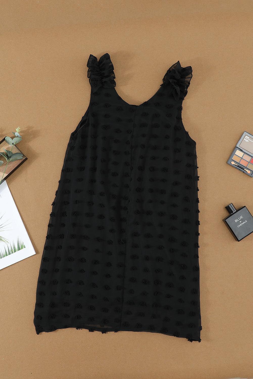 Robe à pois élégante avec col en V et volants