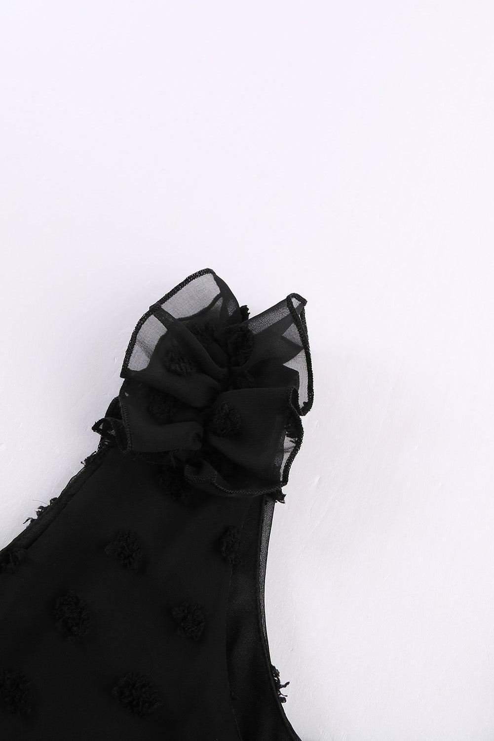 Robe à pois élégante avec col en V et volants