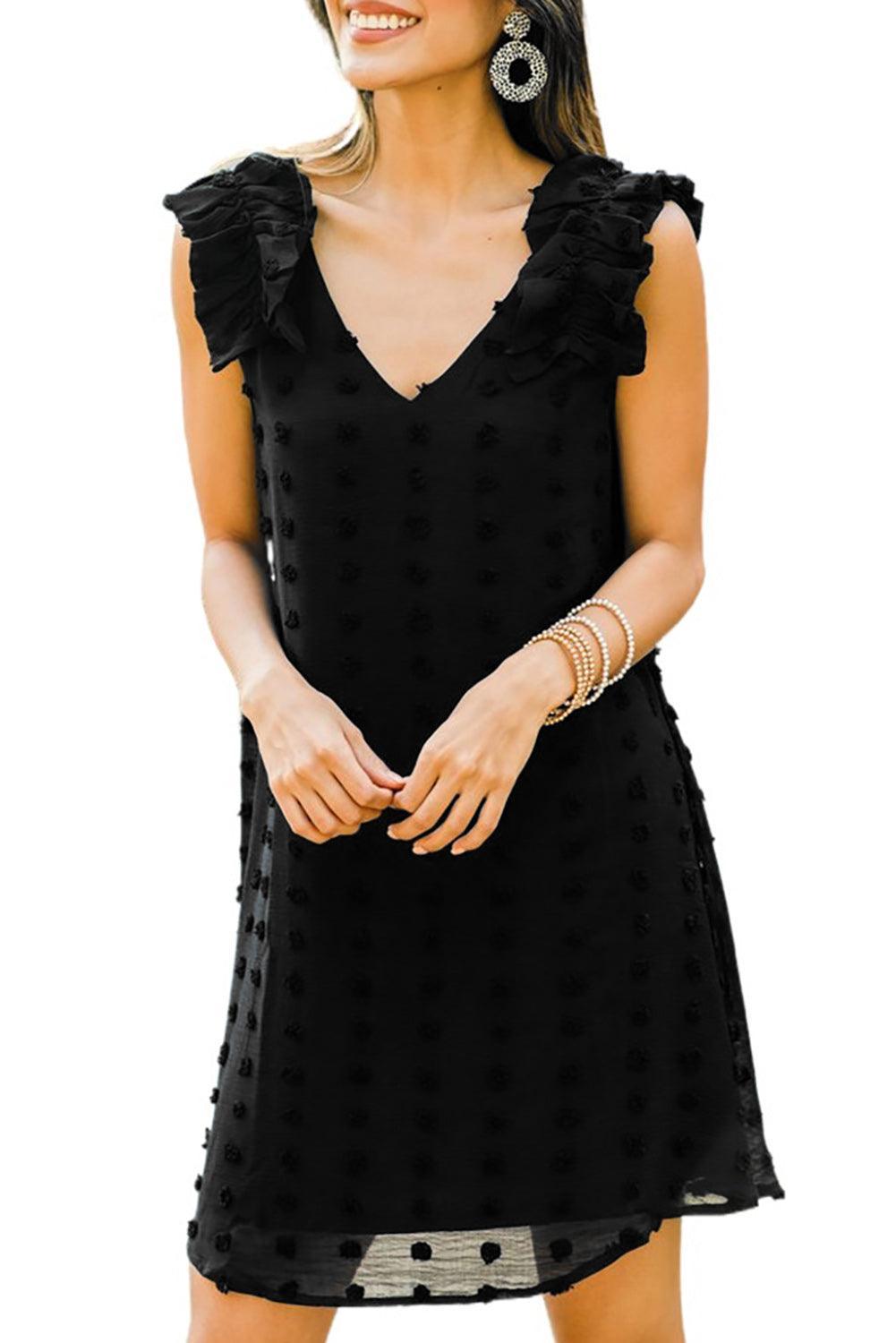 Robe à pois élégante avec col en V et volants