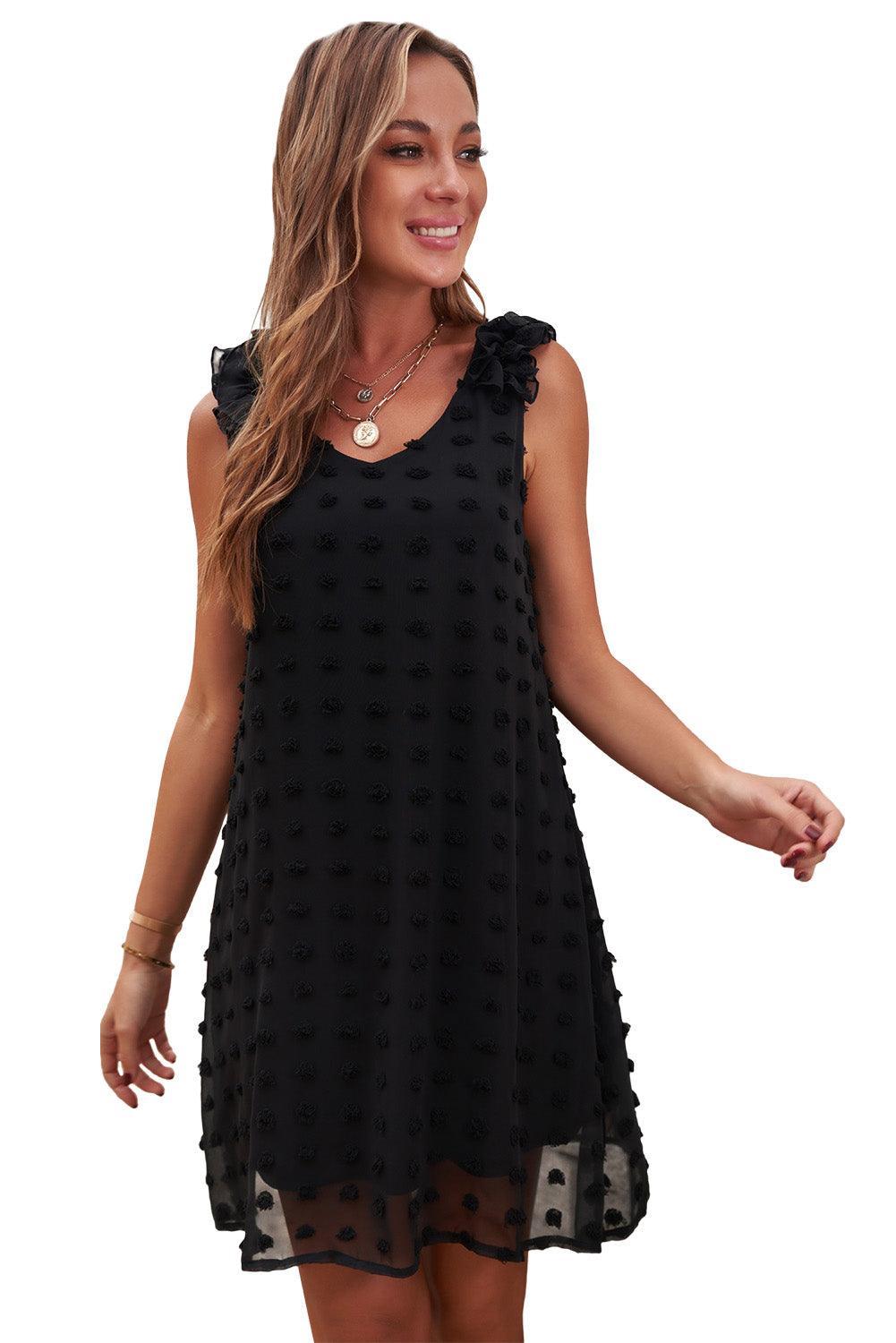 Robe à pois élégante avec col en V et volants