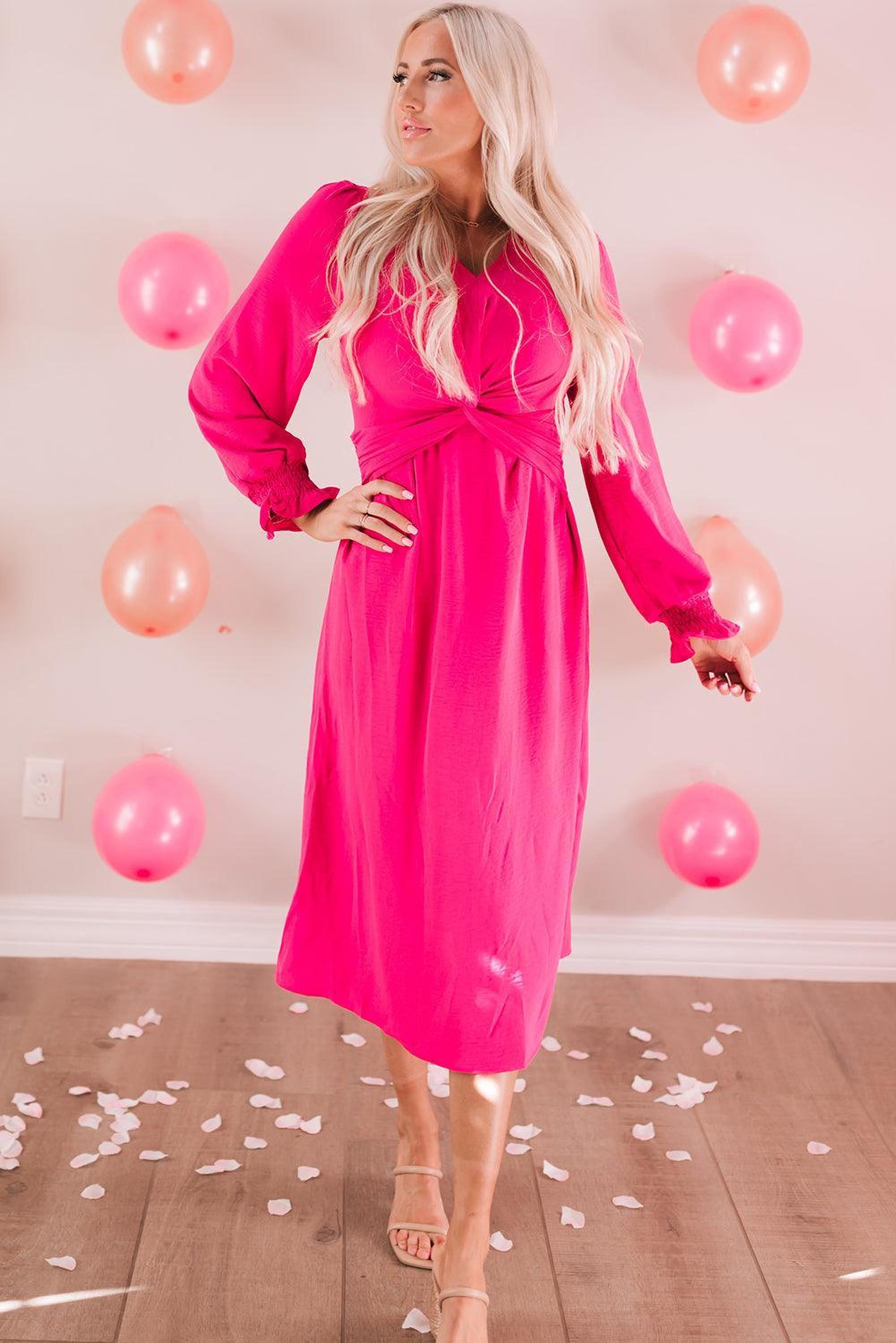 Robe midi élégante avec un devant torsadé et un décolleté en V